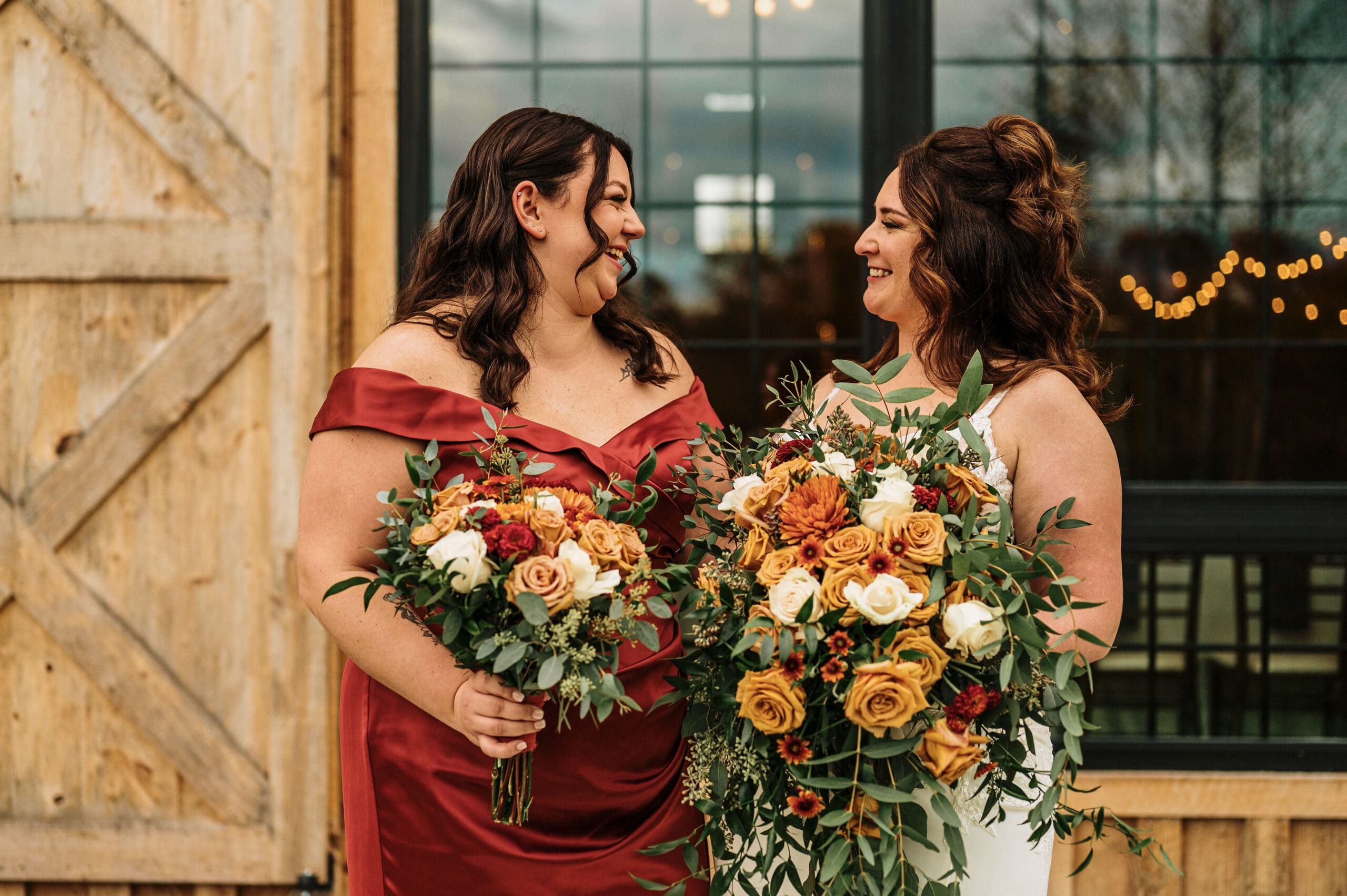 Bridesmaid and Bride Photo In Front Of The Wedding Venue