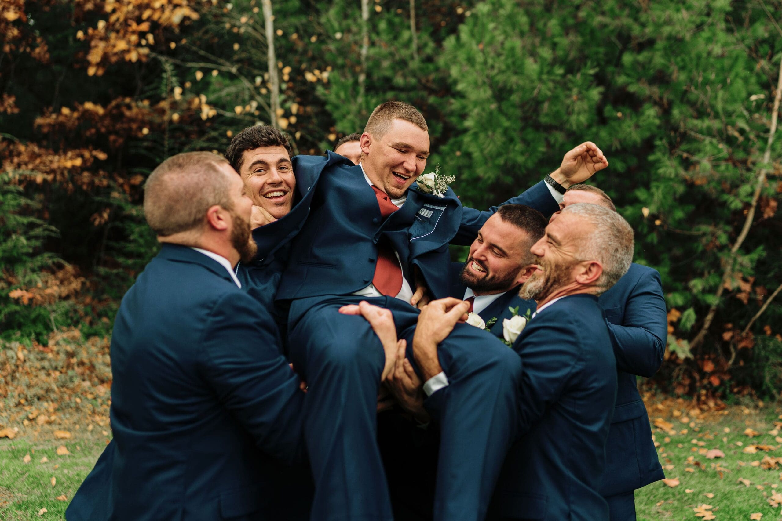 Groomsmen Carrying The Groom Fun Photo