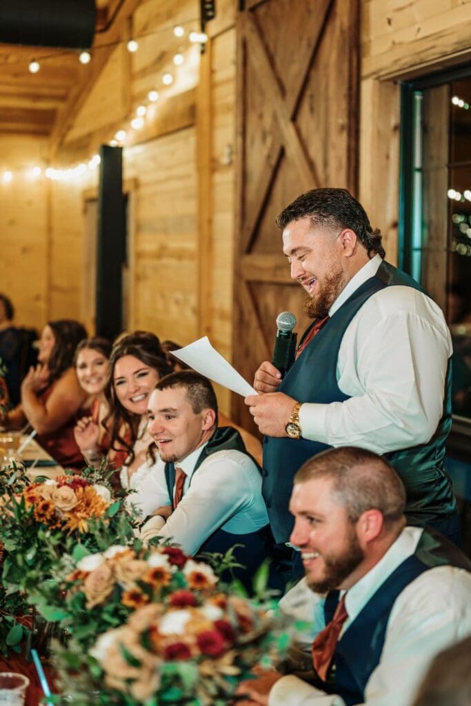 Groomsman Delivering His Speech With Bridal Party
