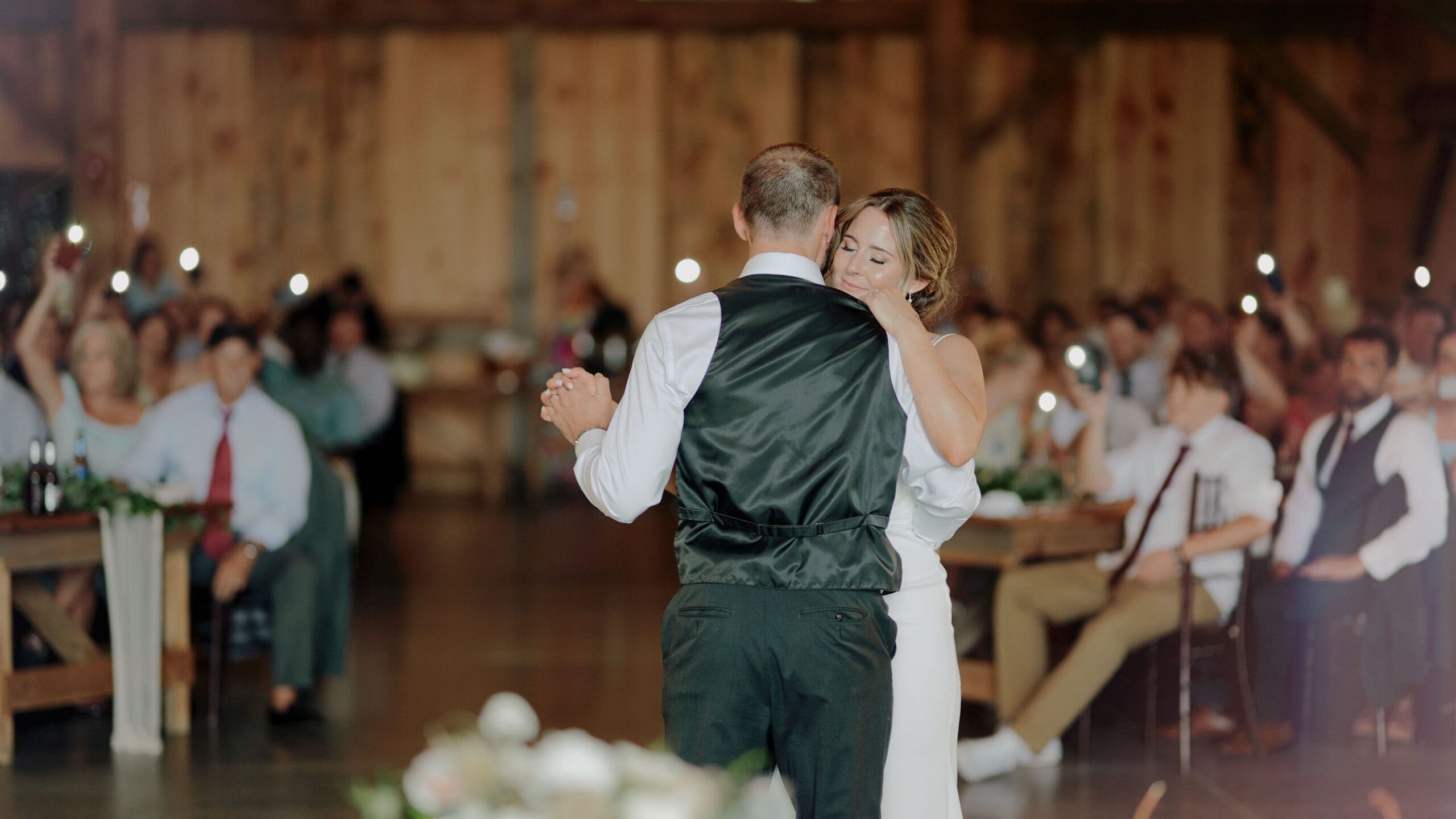 Wedding Dance of Bride and Groom In A Barn Setting