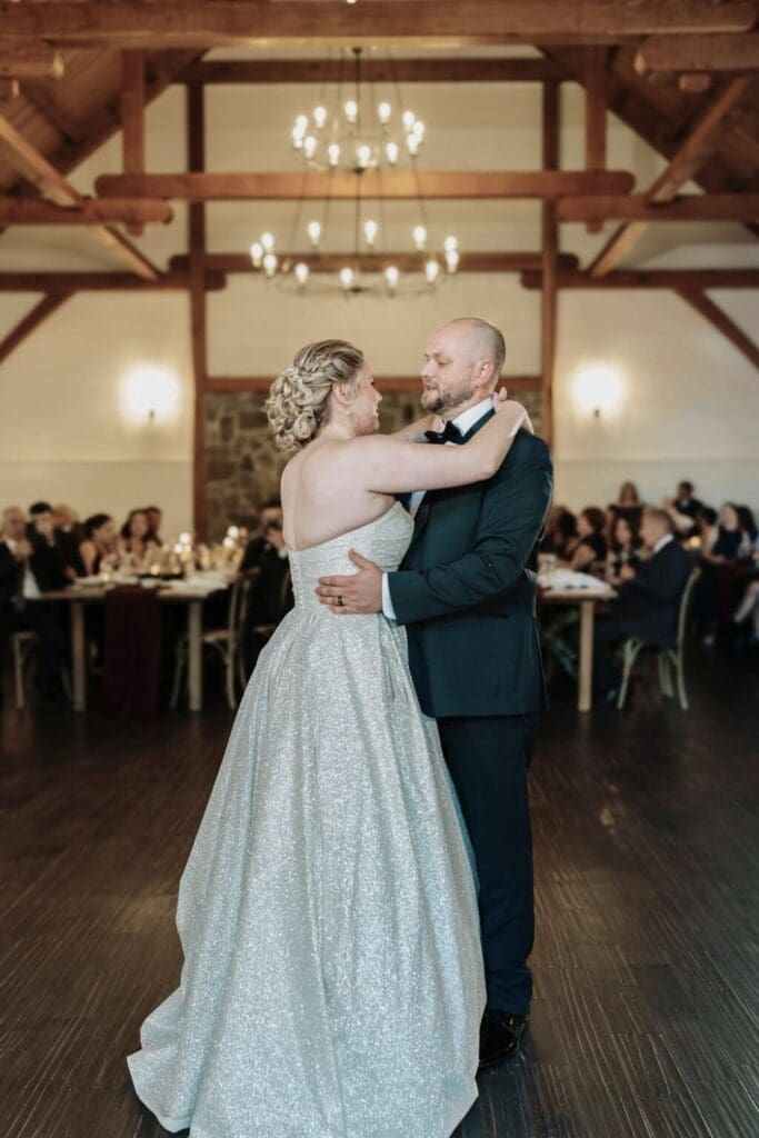 Couple Dancing In An Indoor Wedding Venue