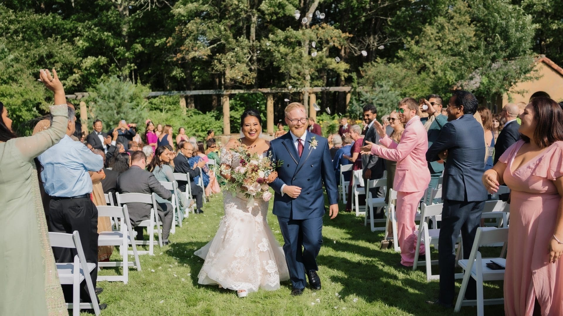 Groom and Bride Walking Down The Aisle Spring Wedding